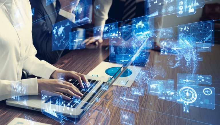 multifamily ai tools Person typing on a laptop surrounded by floating digital interfaces, representing data and technology concepts. mpro Digital Edge