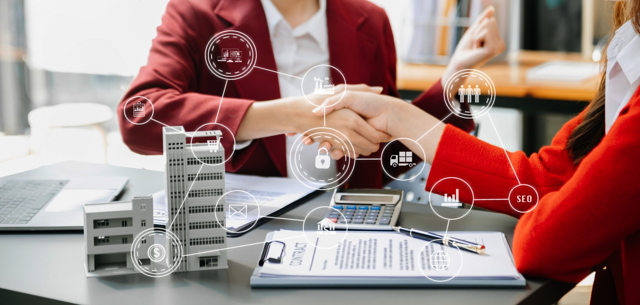 multifamily ai tools Two individuals shaking hands over a contract and calculator, with digital business icons overlayed, suggesting a business agreement or partnership. mpro Digital Edge